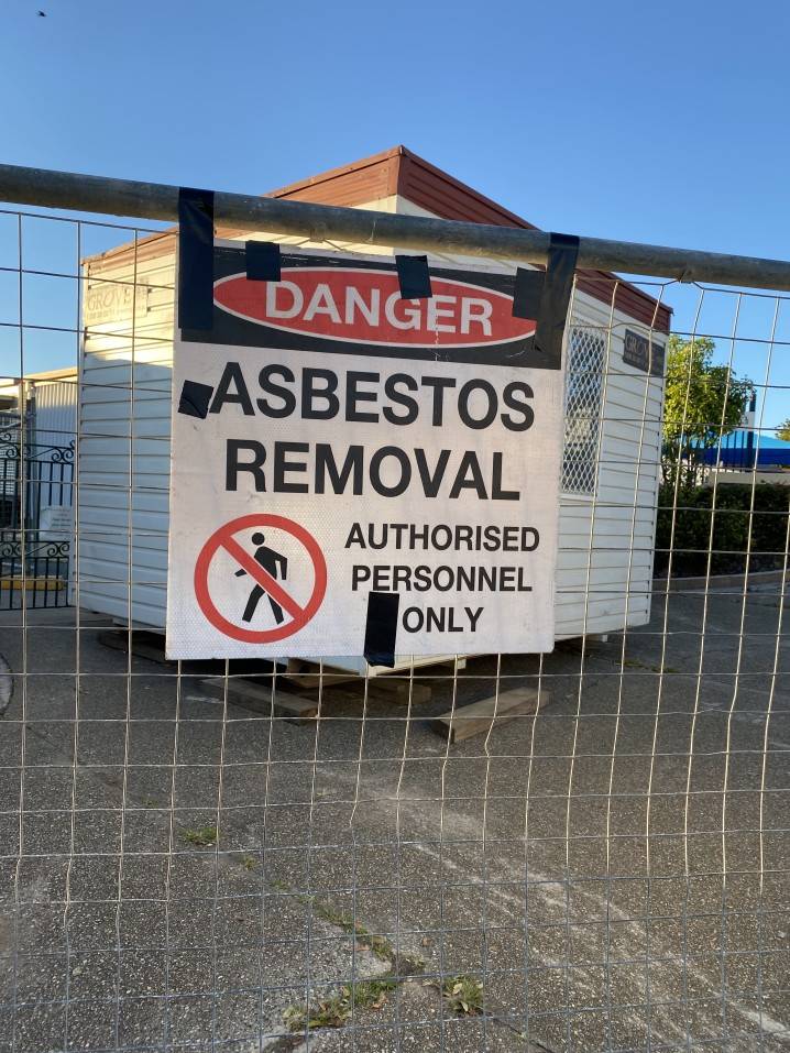 signage warning danger asbestos removal on construction - Decon Solutions Australia Services