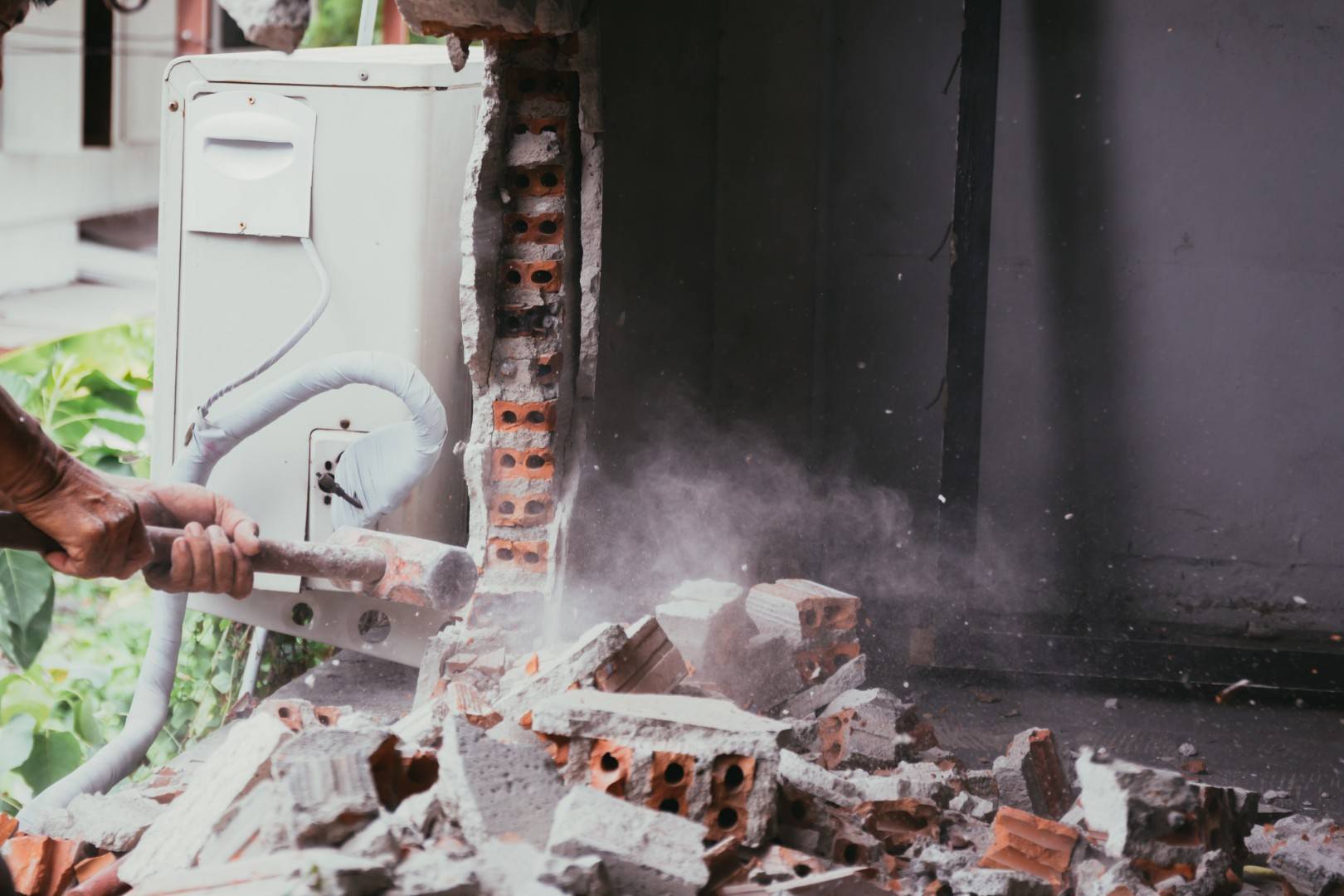 unrecognizable builder using a sledgehammer breaki 2025 01 29 05 49 21 utc Large - Decon Solutions Australia Services